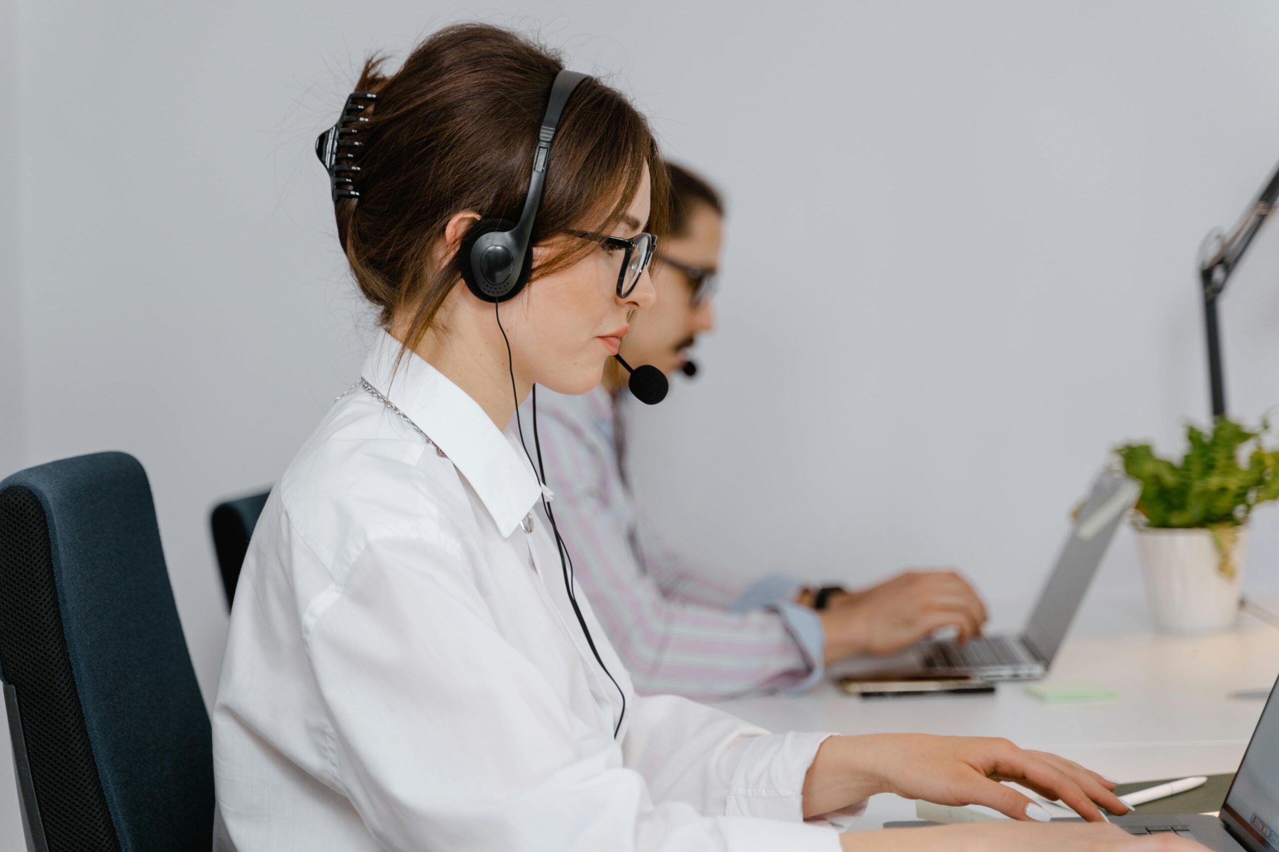 Global emergency hotline operator assisting traveler