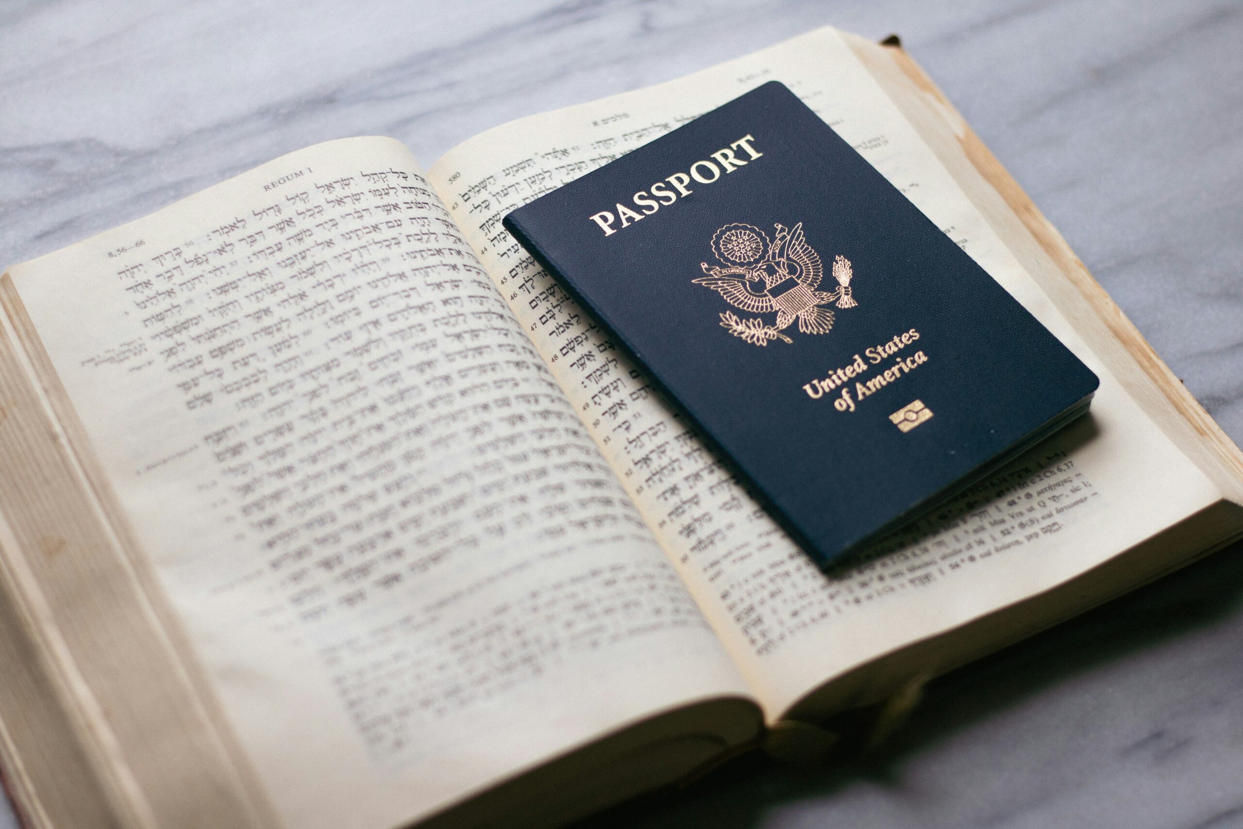 A traveler looking stressed while holding multiple documents