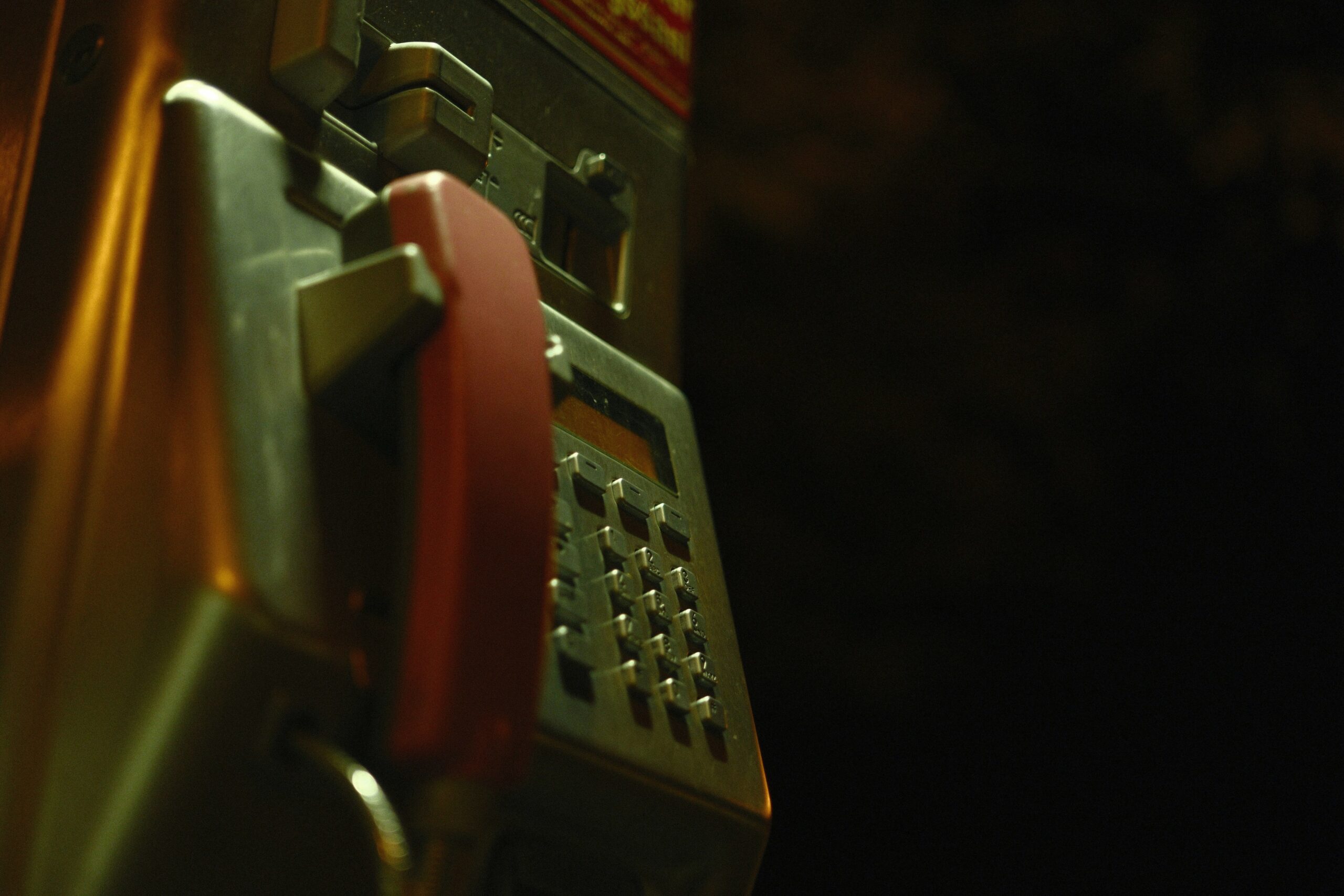 Illustration showing expat calling a repatriation hotline from their mobile phone.