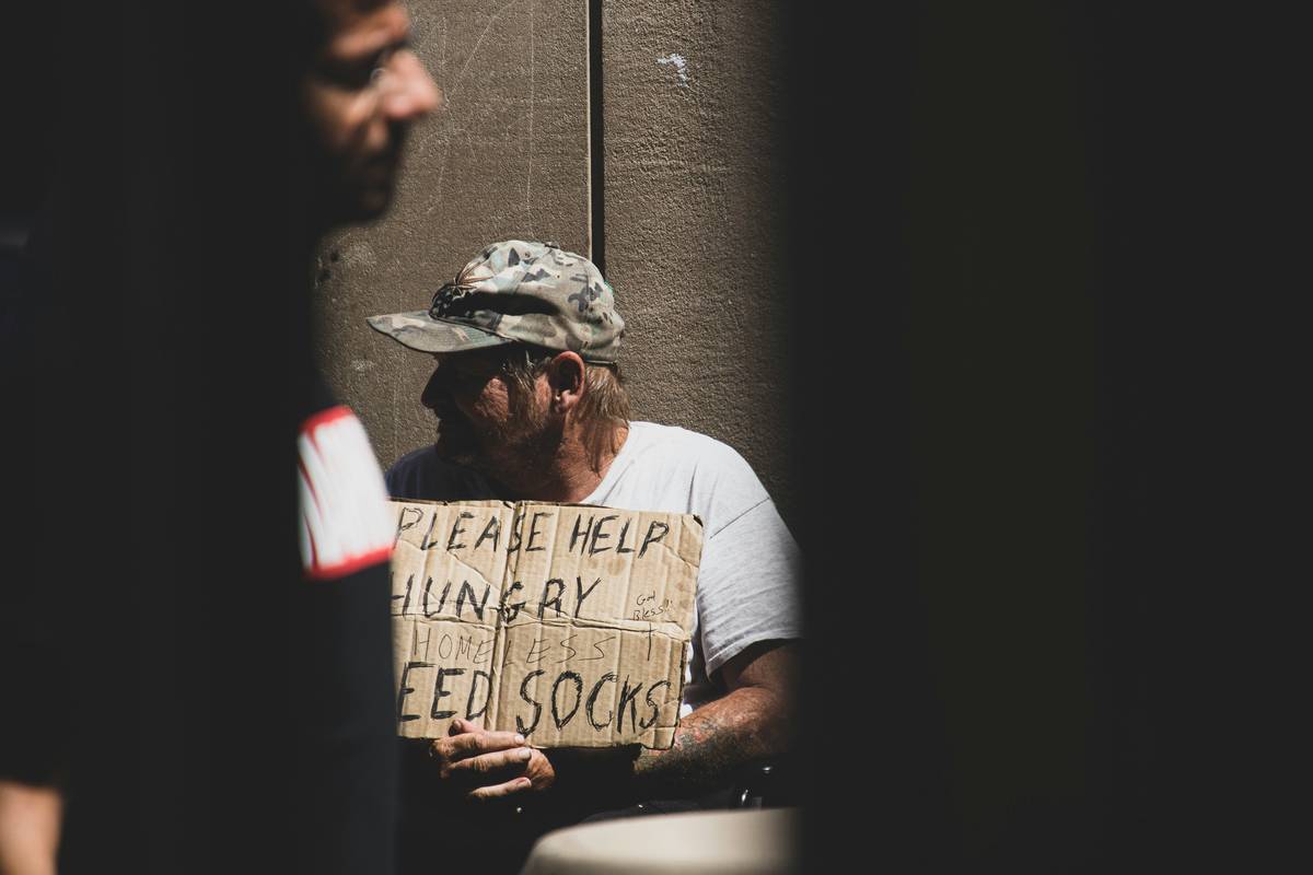 Man using phone to contact repatriation crisis line