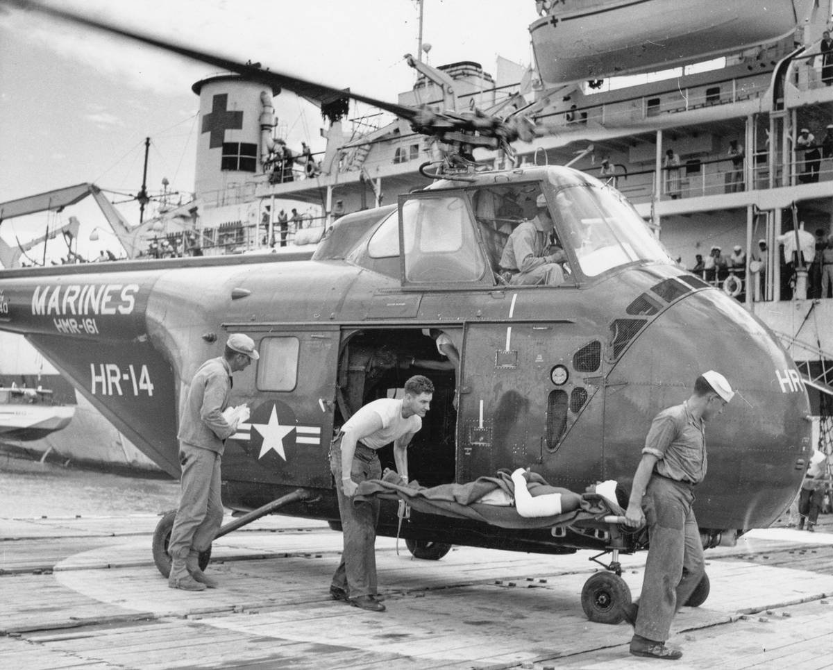 Bar chart comparing average medical evacuation costs by region vs typical insurance coverage caps