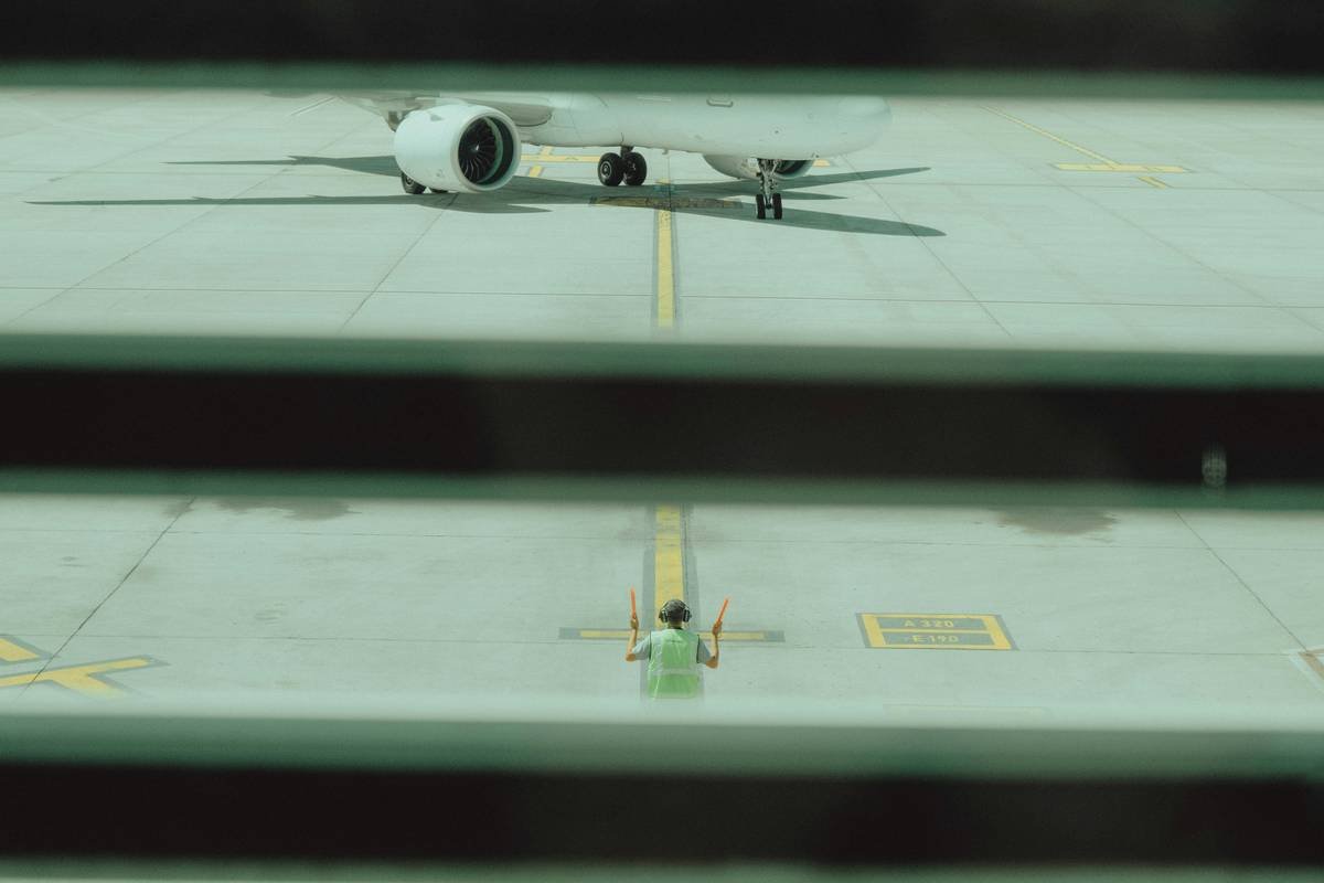 Flowchart showing emergency repatriation logistics steps: medical assessment → case manager assignment → transport coordination → customs clearance → home arrival